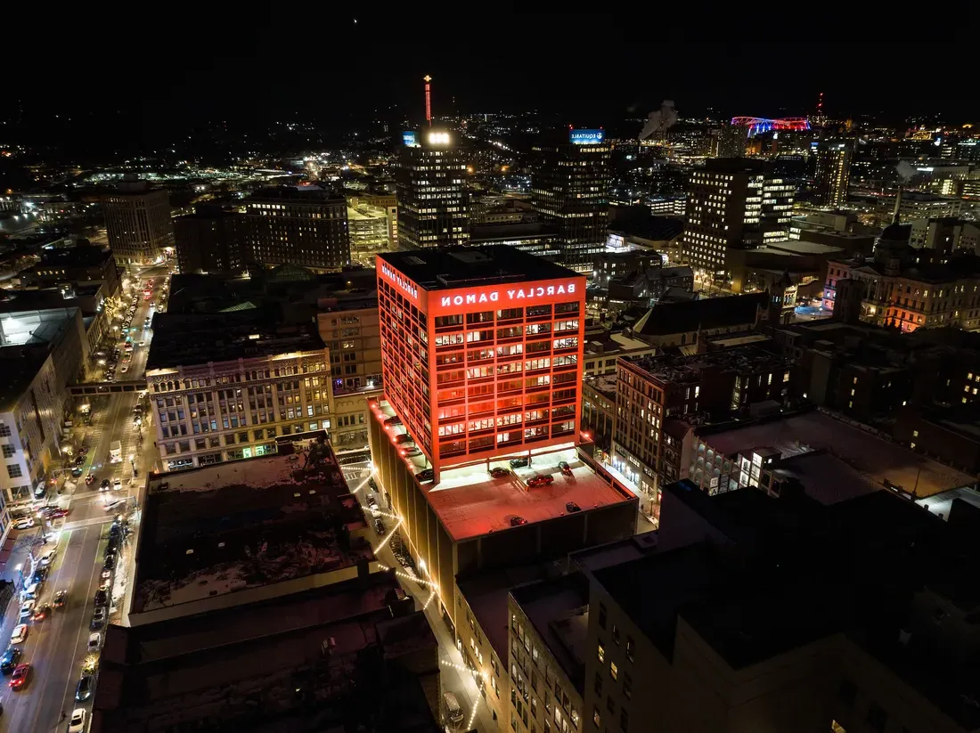 Drone image of the city of Syracuse at night.